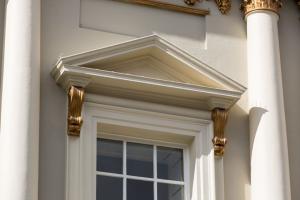 First-floor window pediment